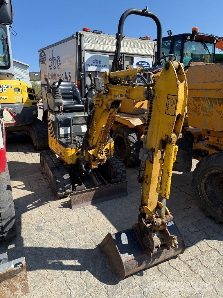 New Holland E 9 SR Minikoparki