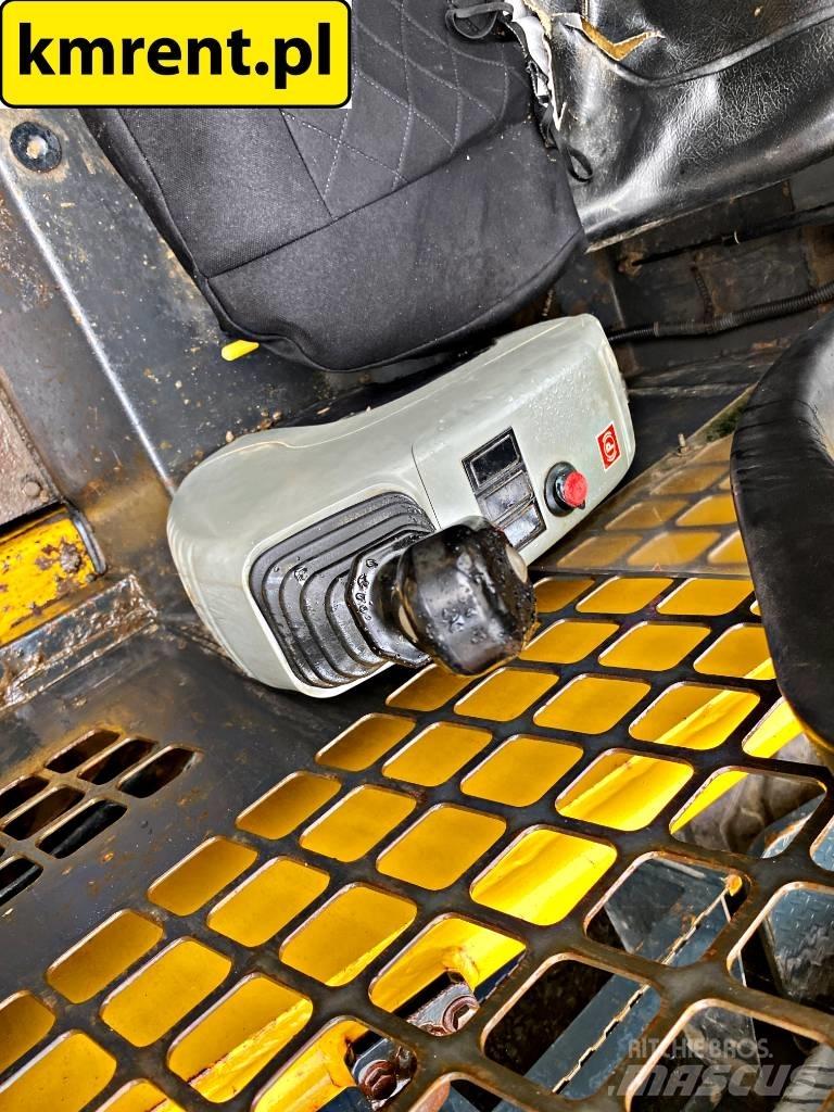 Komatsu SK 815 Ładowarki burtowe