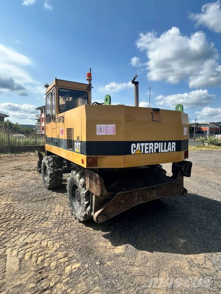 CAT 214 Koparki kołowe