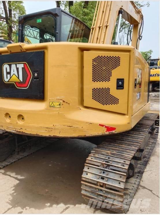 CAT 310 Koparki gąsienicowe