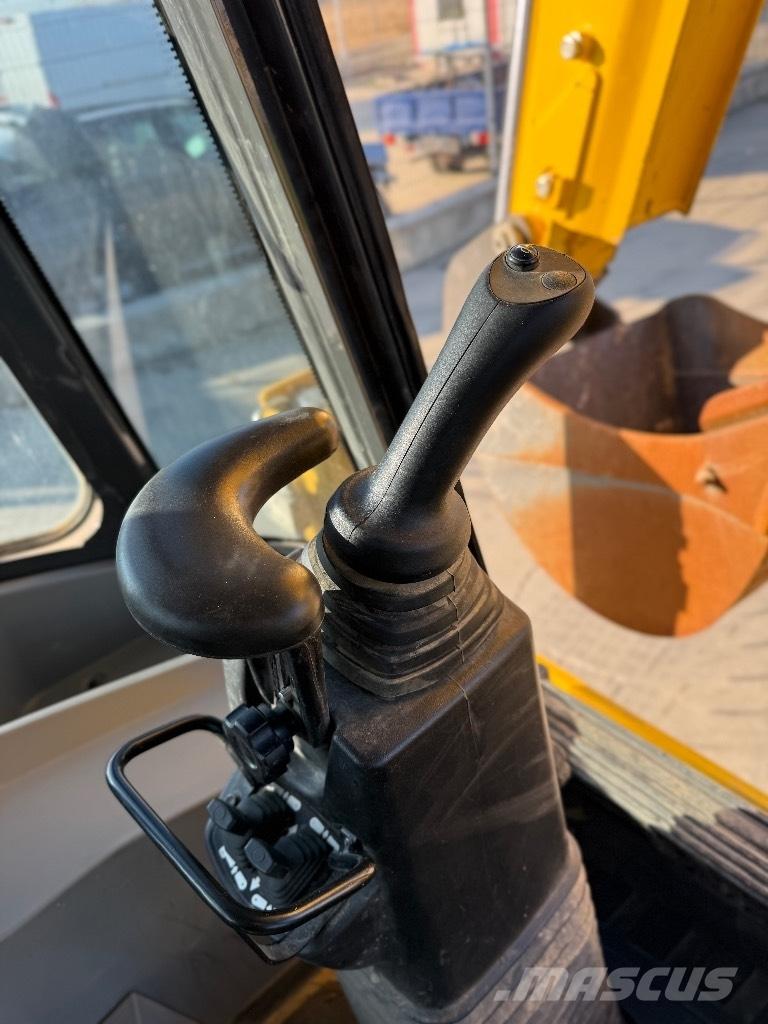 New Holland B 115 Koparko-ładowarki