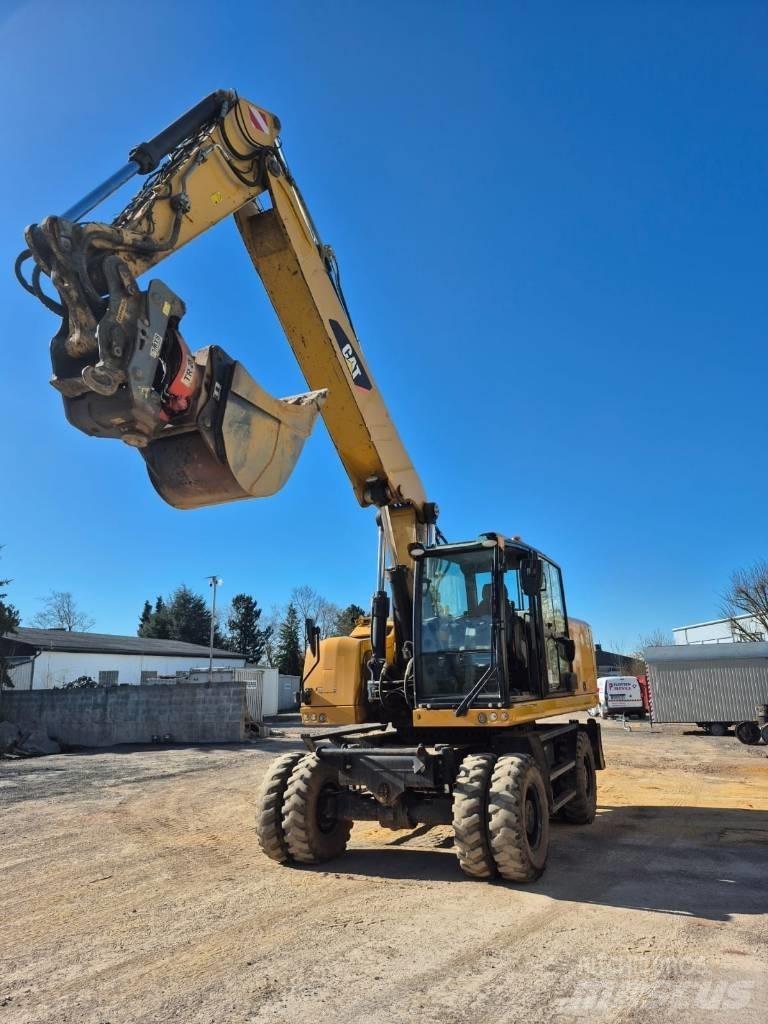 CAT M322F Koparki kołowe