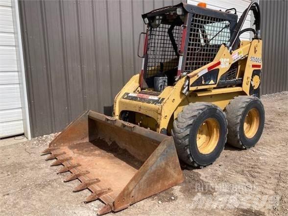 CAT 228 Ładowarki burtowe