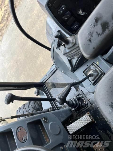 Terex TLB840R Koparko-ładowarki