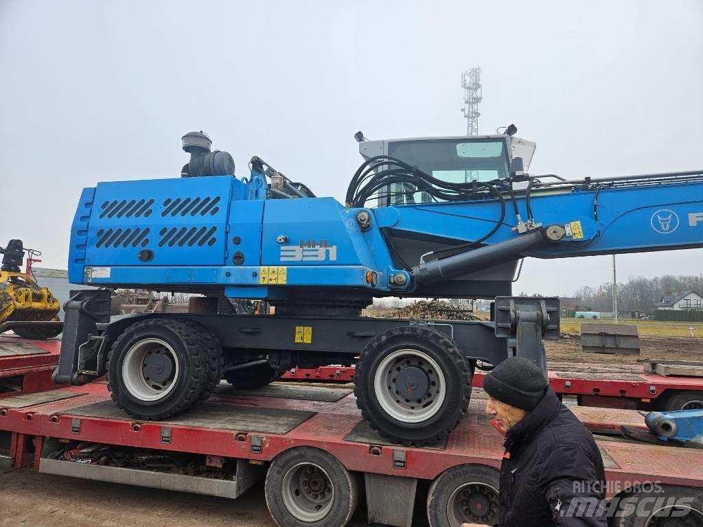 Fuchs MHL 331 Koparki przeładunkowe