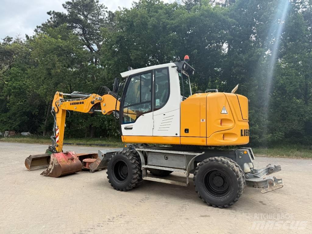 Liebherr A 910 Comp Koparki kołowe