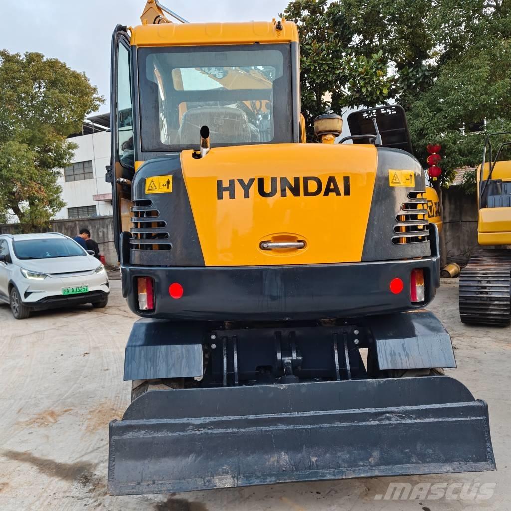 Hyundai 60 W VS Koparki kołowe