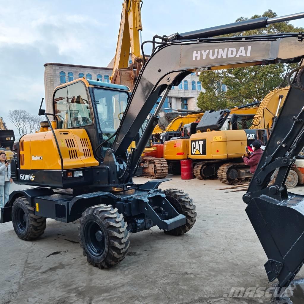Hyundai 60 W VS Koparki kołowe