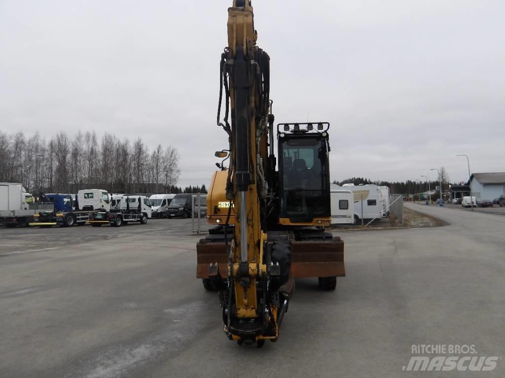CAT M 318 Koparki kołowe