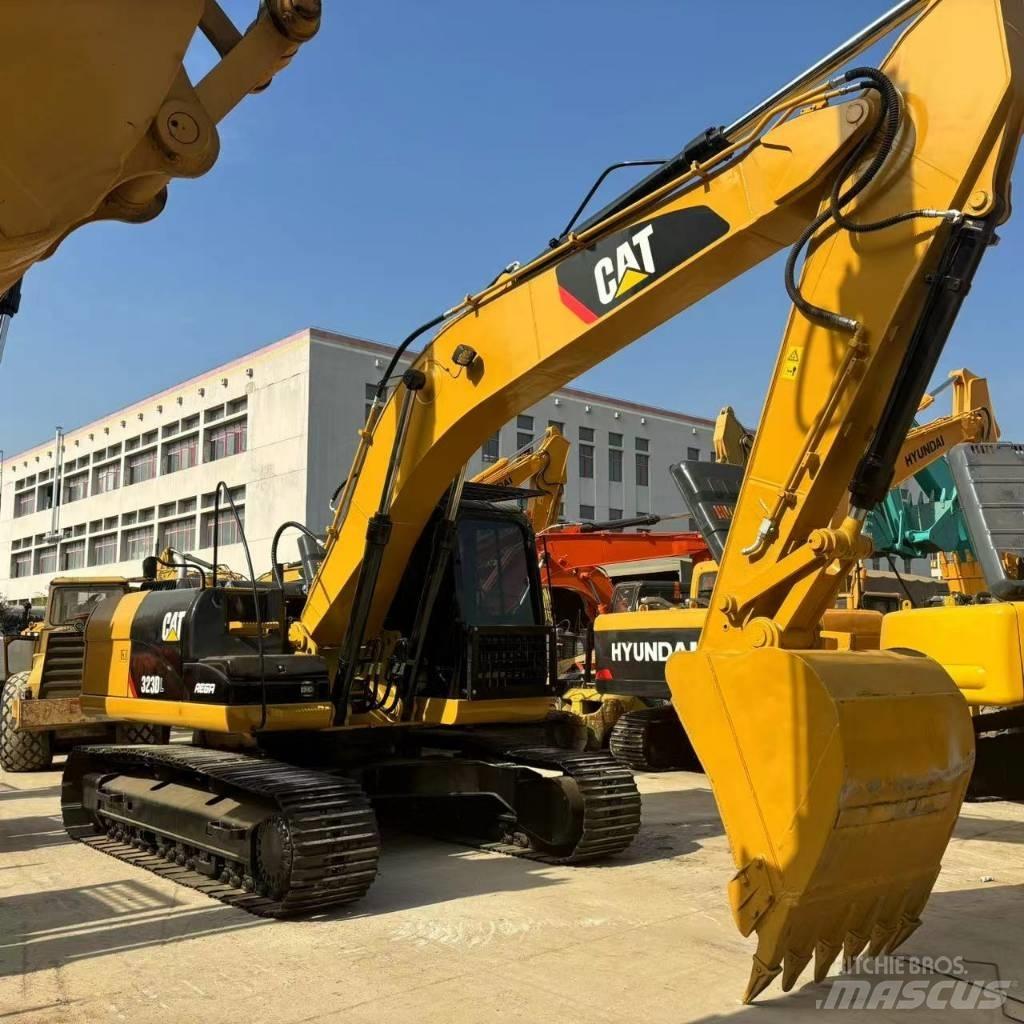 CAT 323 D L Koparki gąsienicowe