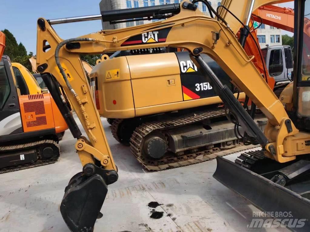 CAT 303c Minikoparki