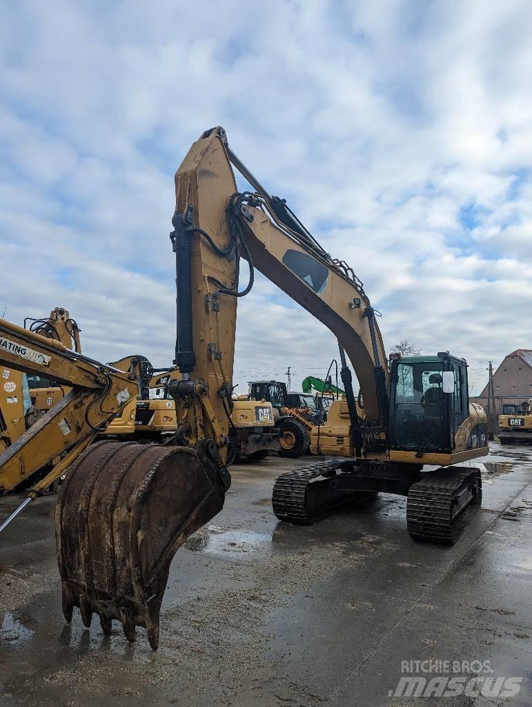 CAT 323 D Koparki gąsienicowe