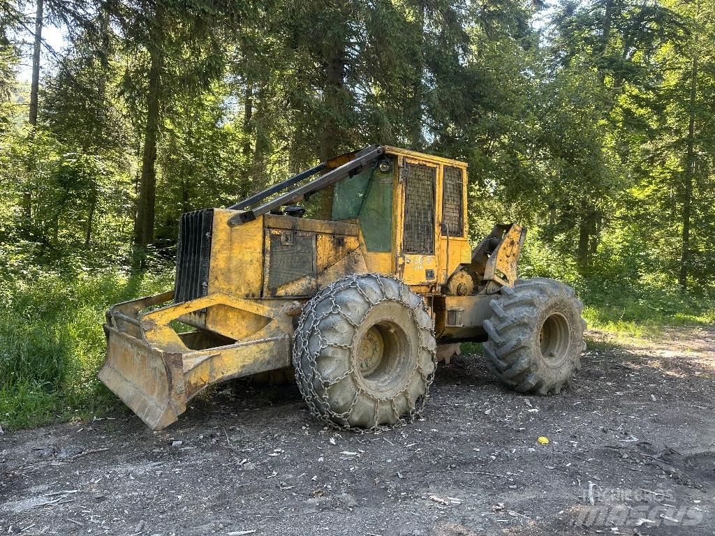 John Deere 540 E Skidery