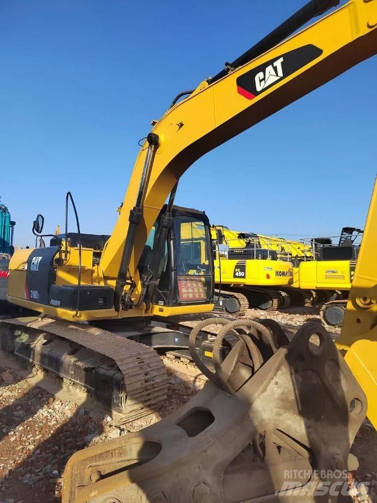 CAT 318 Koparki gąsienicowe