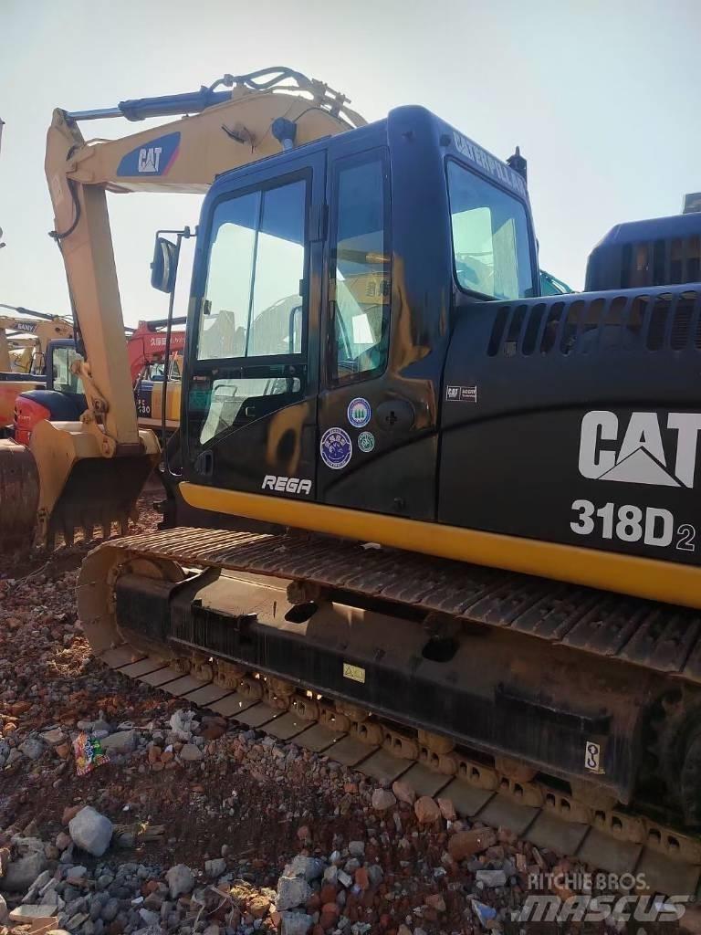 CAT 318 Koparki gąsienicowe