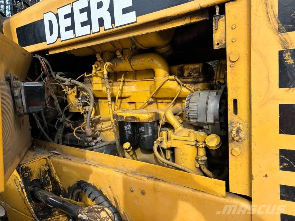 John Deere 640 D Skidery