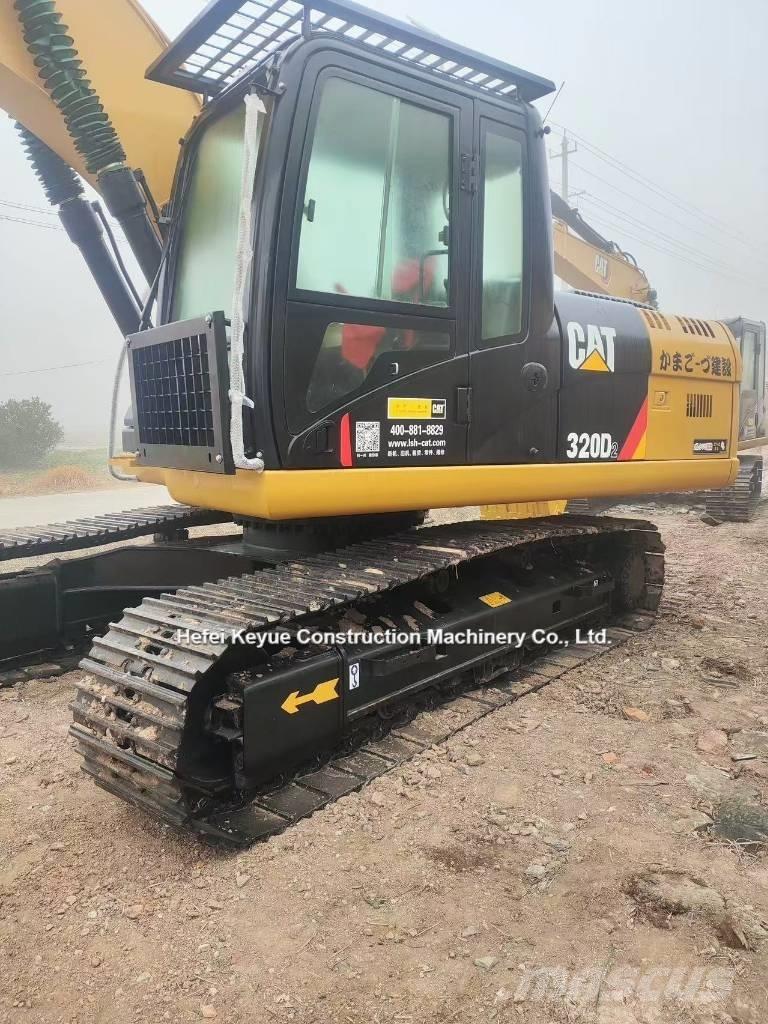 CAT 323 Koparki gąsienicowe