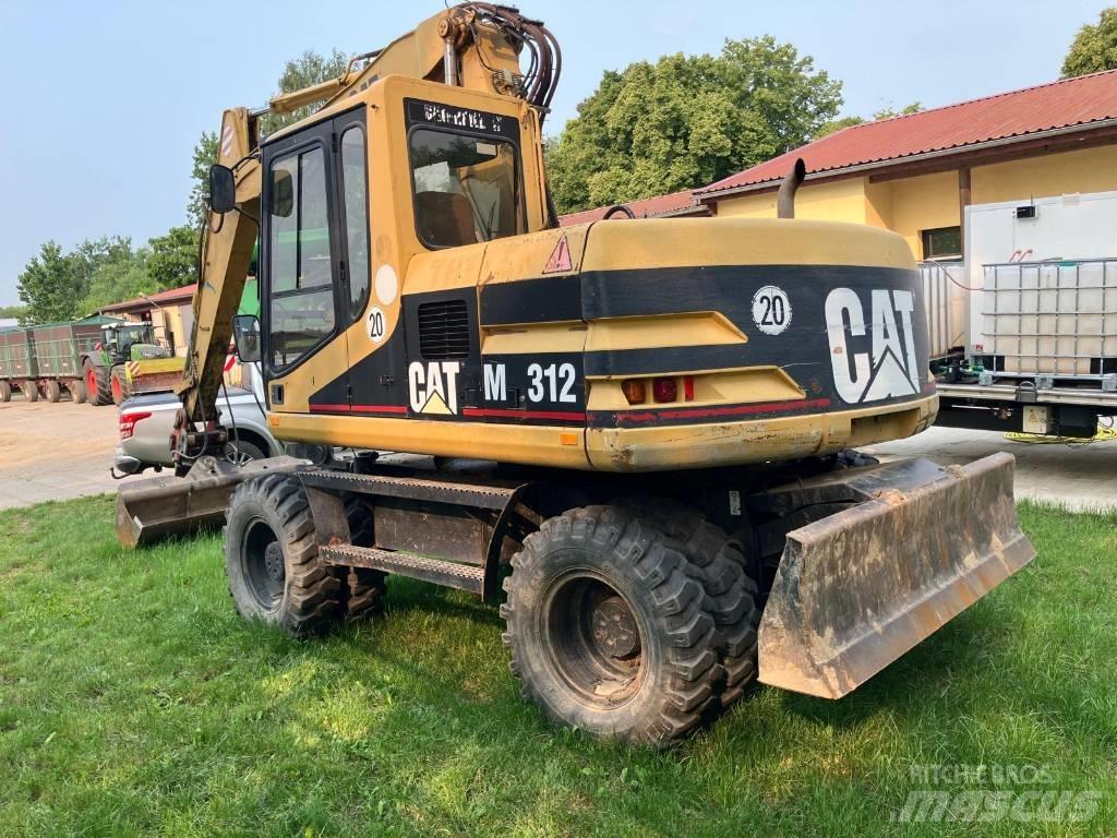 CAT M 312 Koparki kołowe