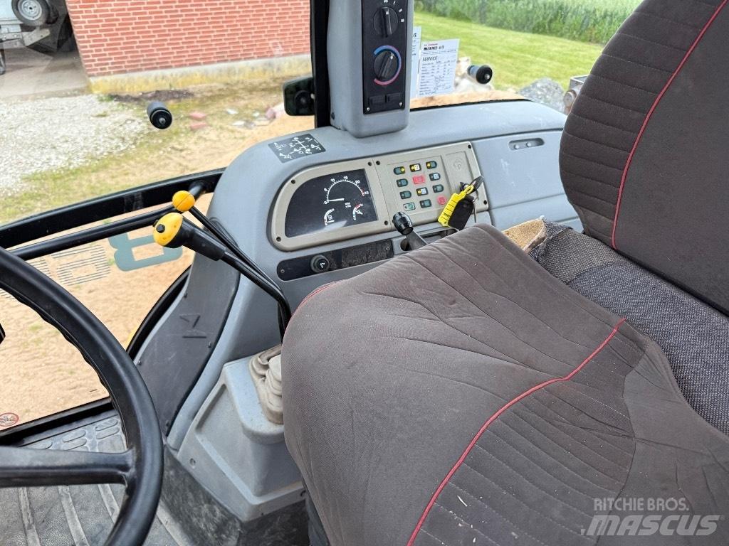 Fermec 860 Koparko-ładowarki