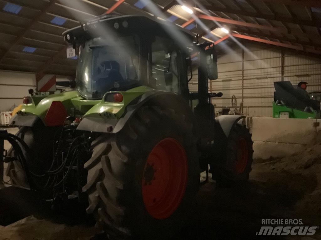 CLAAS ARION 650 cis + Ciągniki rolnicze