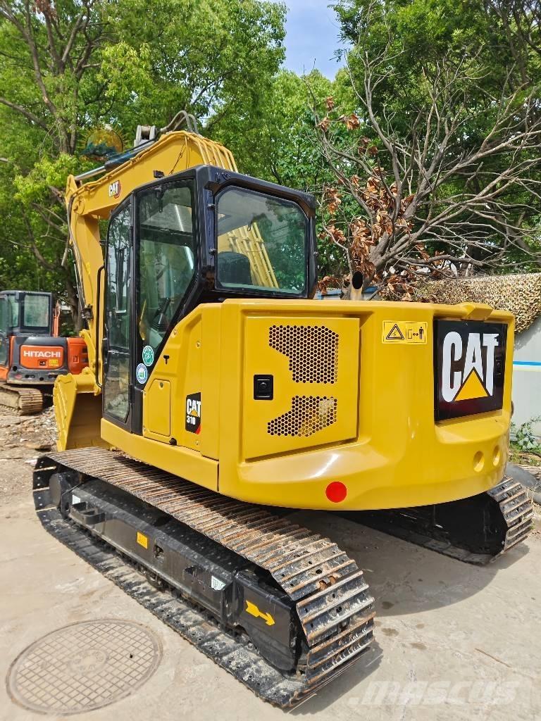 CAT 310 Koparki gąsienicowe