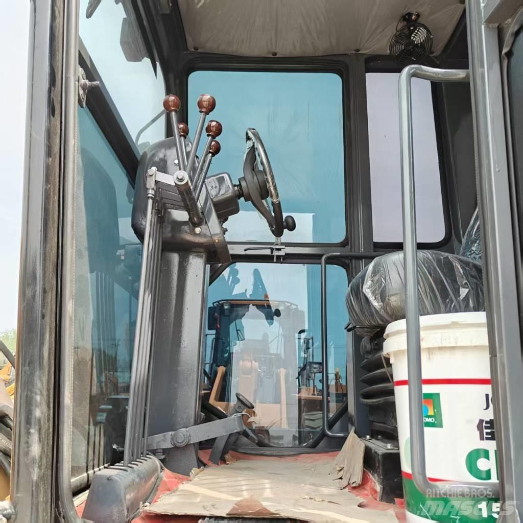 CAT 140 H Koparki gąsienicowe