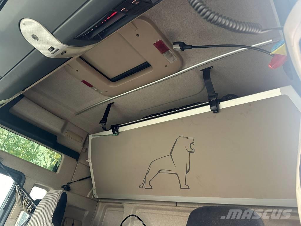 MAN TGX 33.500 Samochody do przewozu maszyn leśnych