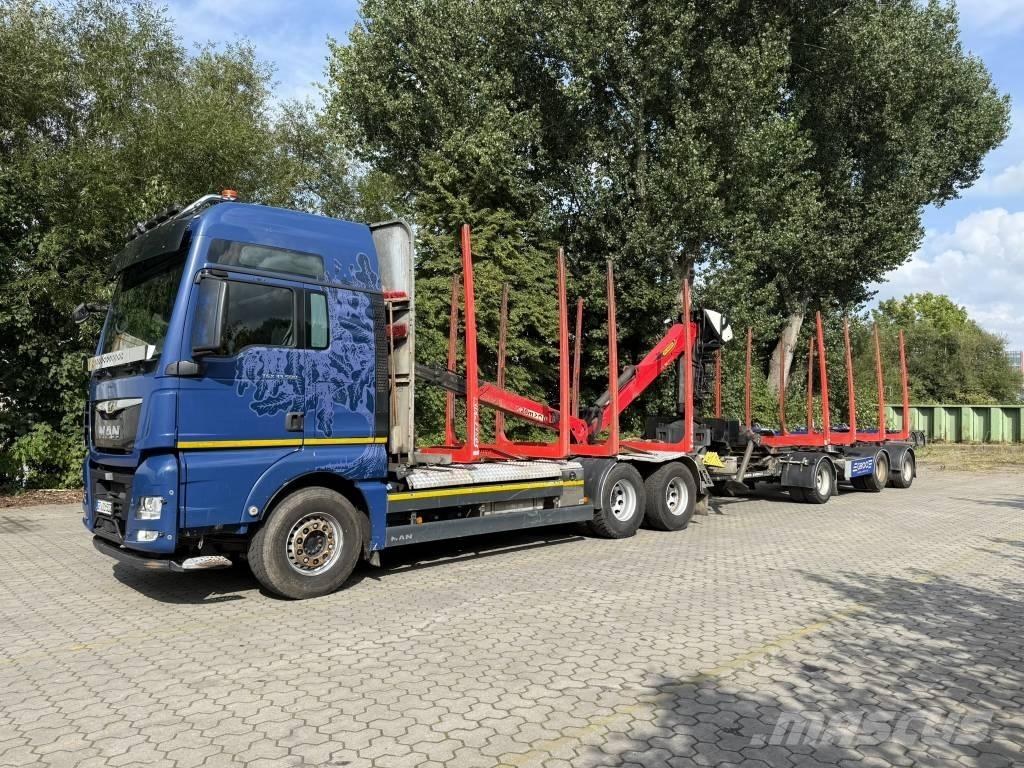 MAN TGX 33.500 Samochody do przewozu maszyn leśnych