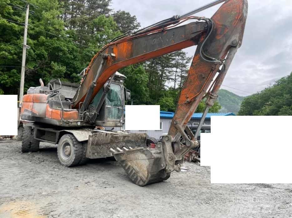 Doosan DX 210 W Koparki kołowe