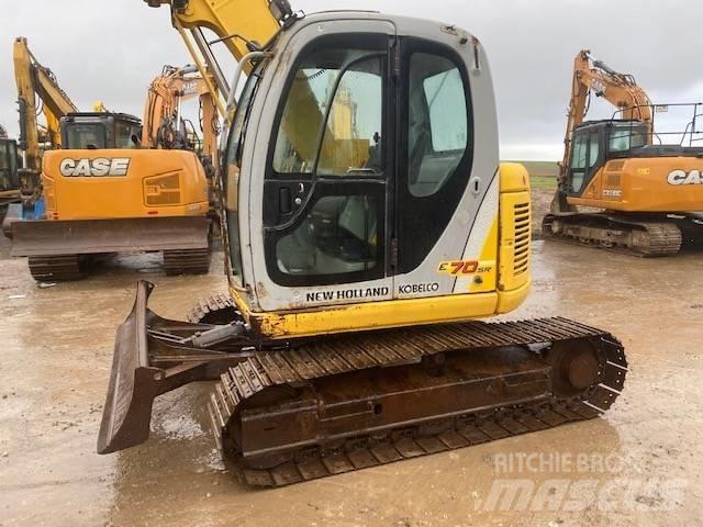 New Holland E 70 SR Midikoparki  7t - 12t