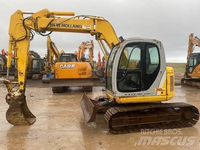 New Holland E 70 SR Midikoparki  7t - 12t