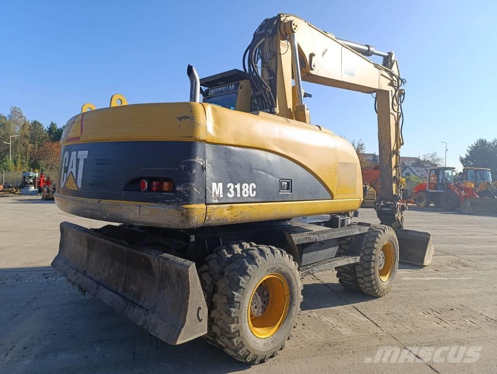 CAT M 318 C Koparki kołowe