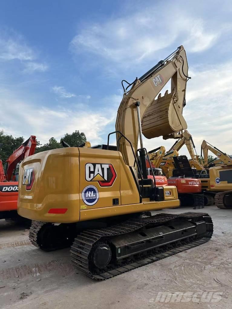 CAT 323 Koparki gąsienicowe