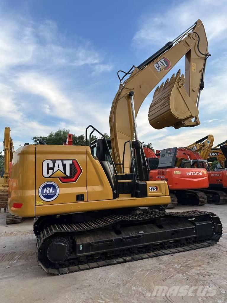 CAT 323 Koparki gąsienicowe