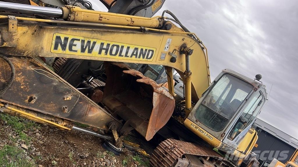 New Holland E 215 B Wysięgniki i ramiona