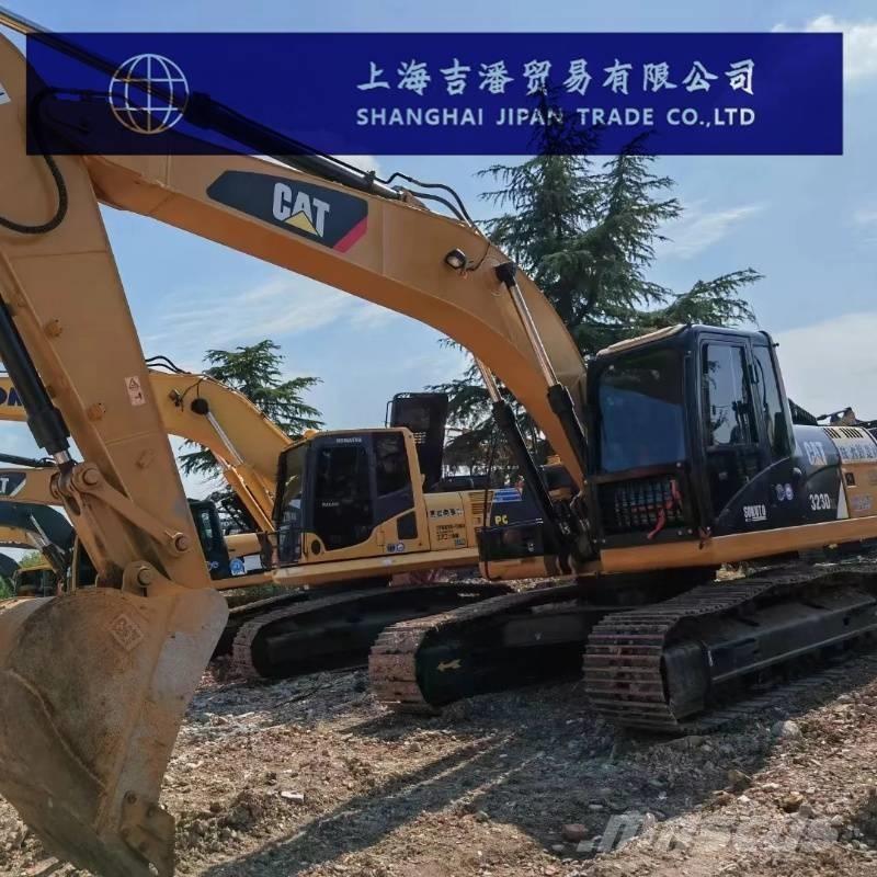 CAT 323 D Koparki gąsienicowe