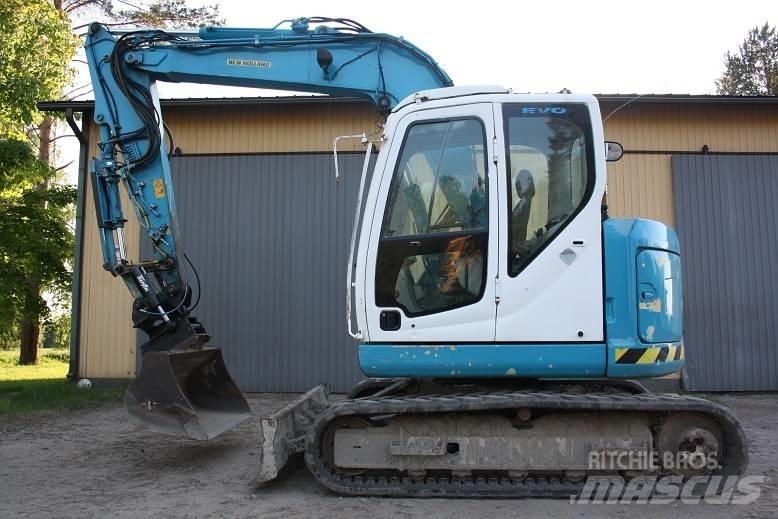  New Hollan E 70 BSR Midikoparki  7t - 12t