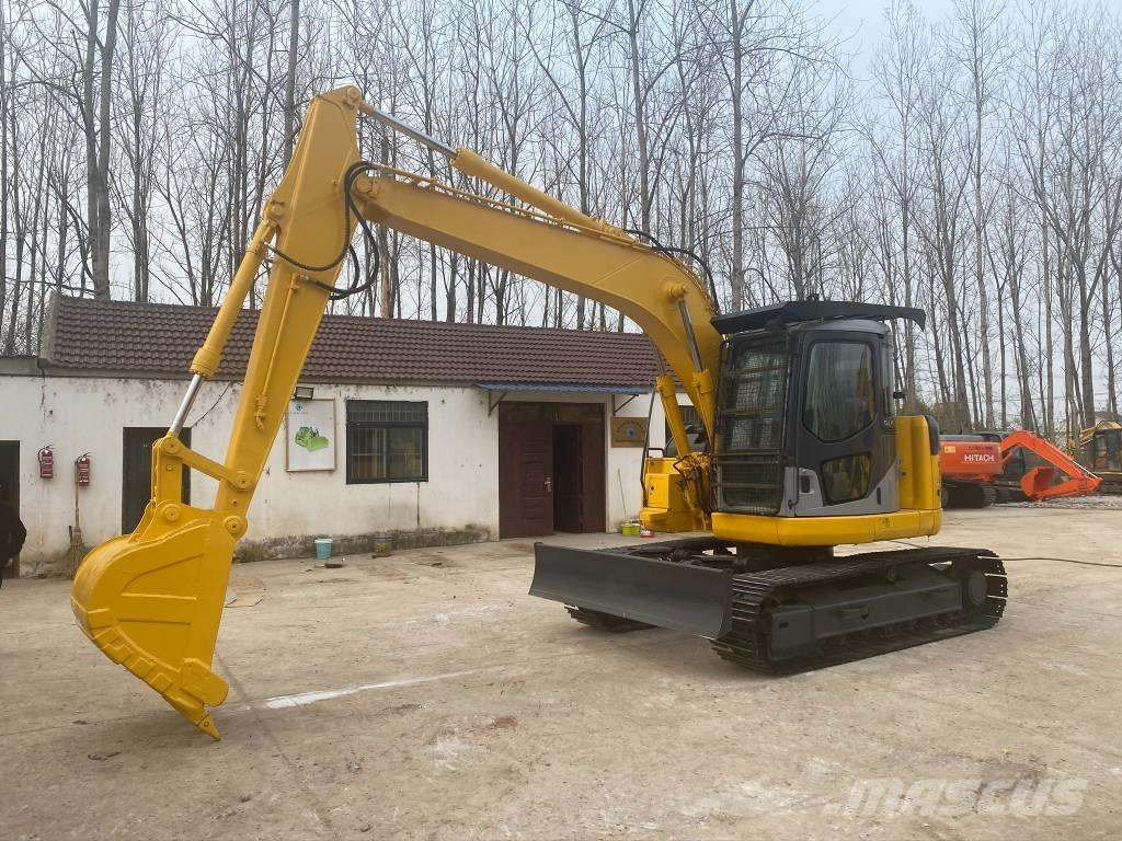 Komatsu PC128US Koparki gąsienicowe