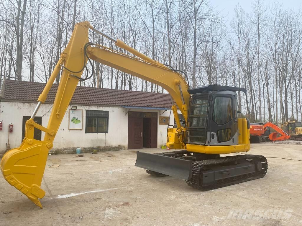 Komatsu PC128US Koparki gąsienicowe