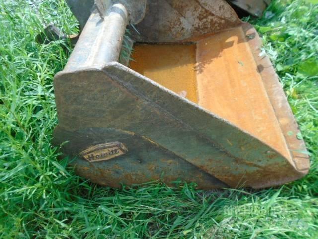 CAT 215 Koparki gąsienicowe