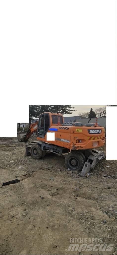 Doosan DX 210 W Koparki kołowe