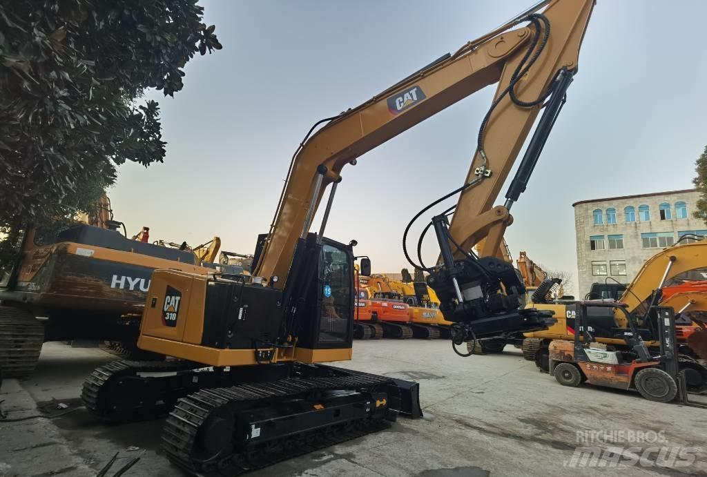 CAT 310 Koparki gąsienicowe