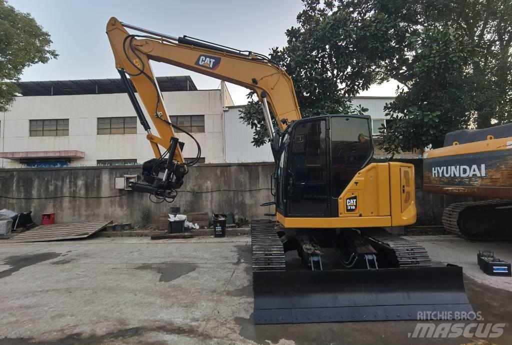CAT 310 Koparki gąsienicowe