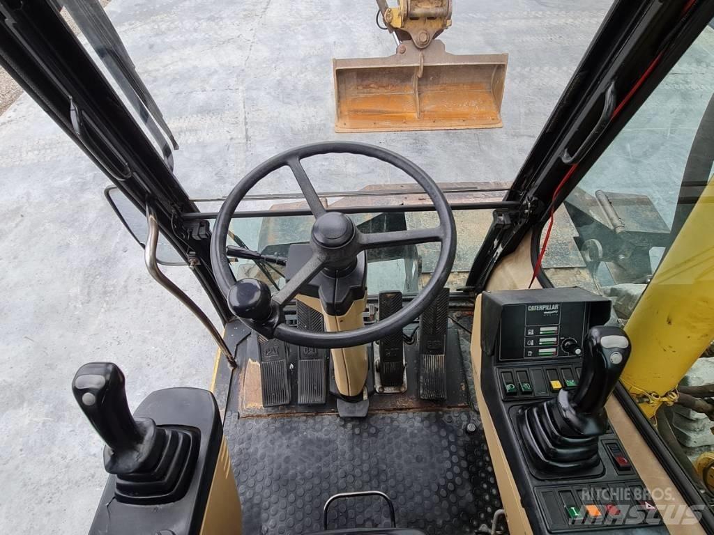 CAT M 312 Koparki kołowe