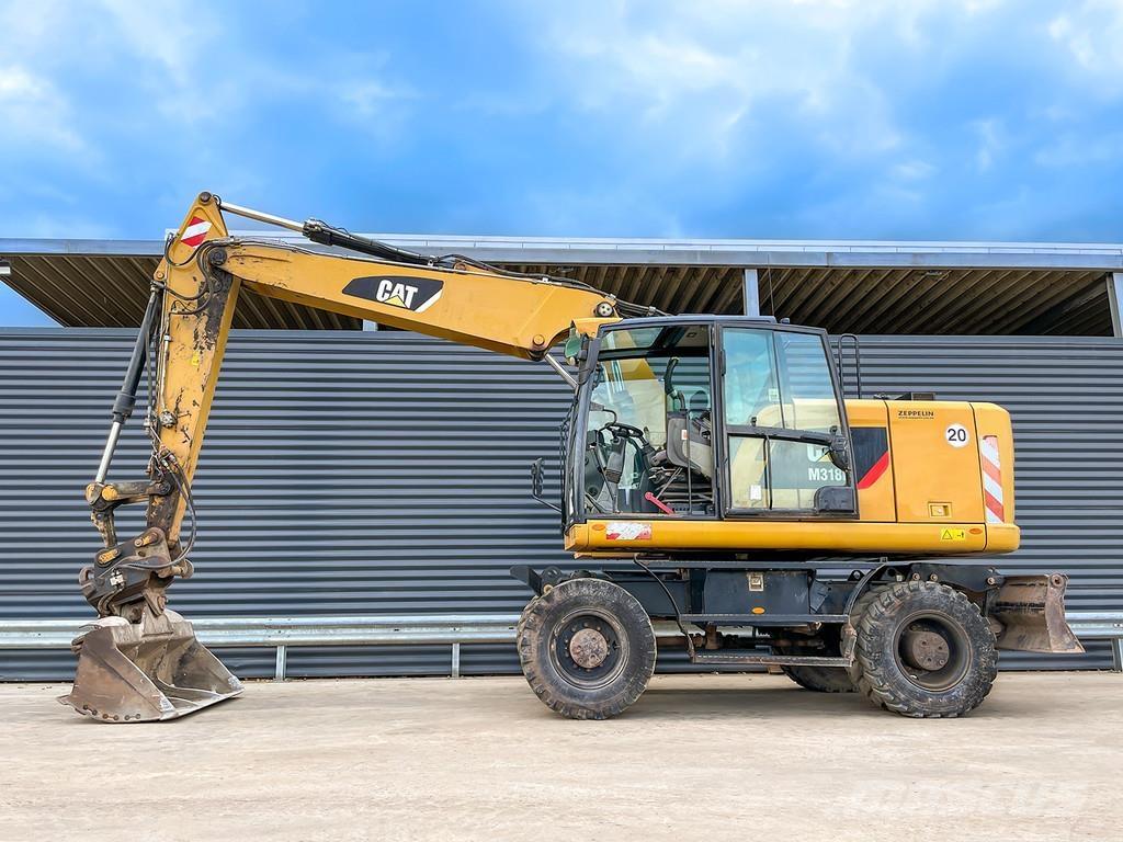 CAT M318F Koparki kołowe