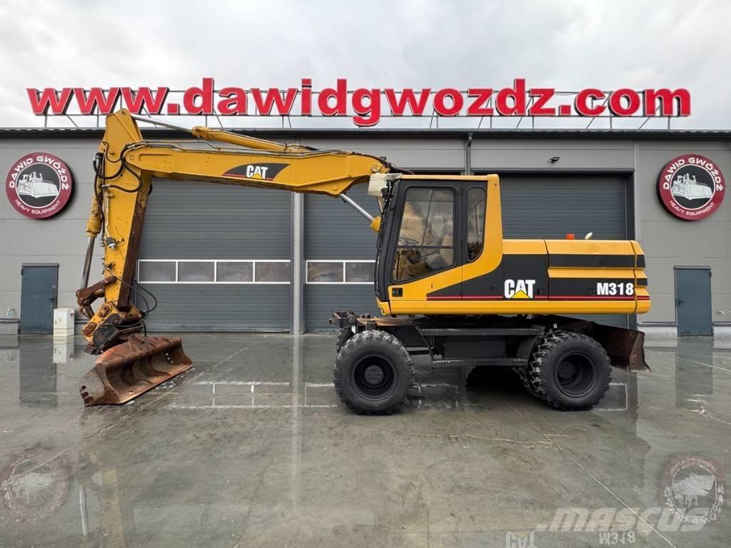 CAT M 318 Koparki kołowe