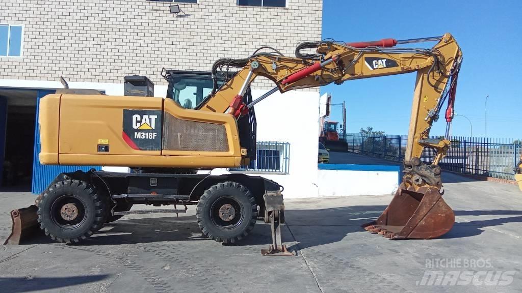 CAT M318F Koparki kołowe