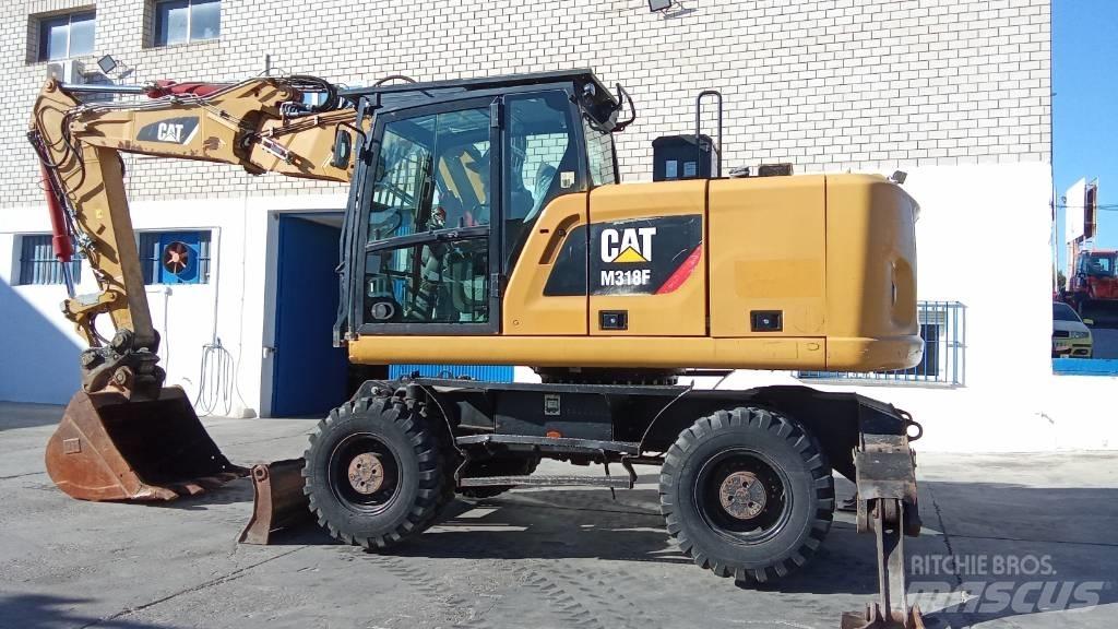 CAT M318F Koparki kołowe