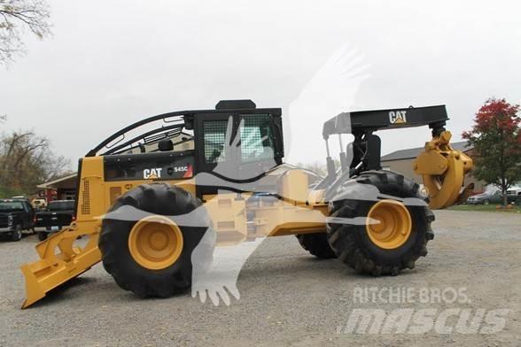CAT 545C Skidery