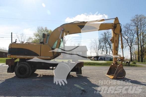 CAT M318C Koparki kołowe